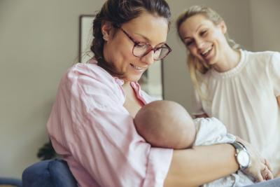 lactation consultant helping mom and baby