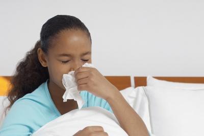 girl-blowing-nose