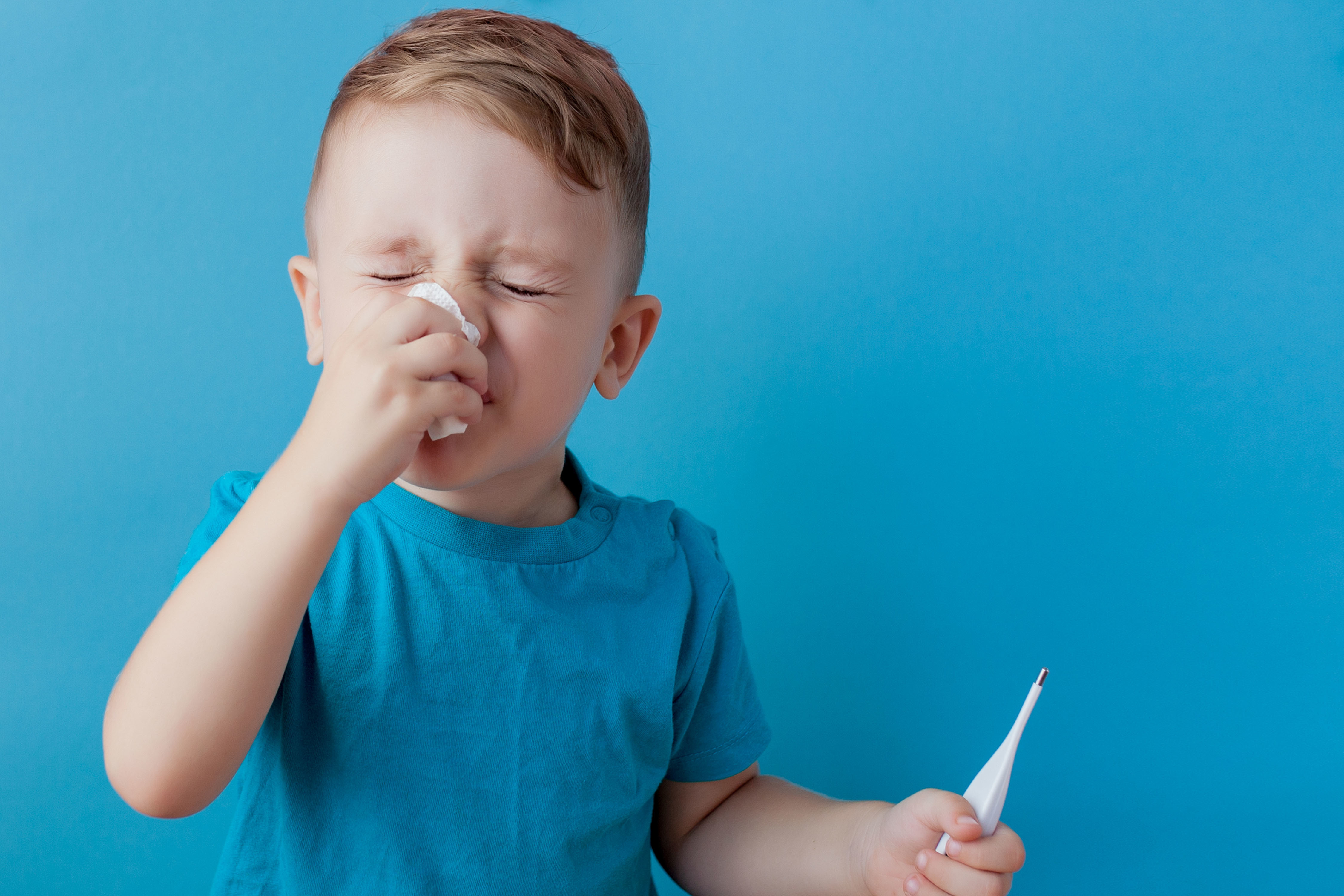 boy with thermometer fever sick flu cold sickness illness symptoms